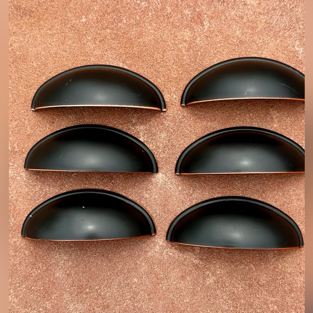 6 Bronze colored pre-owned Cabinet Drawer Pulls. No screws included.